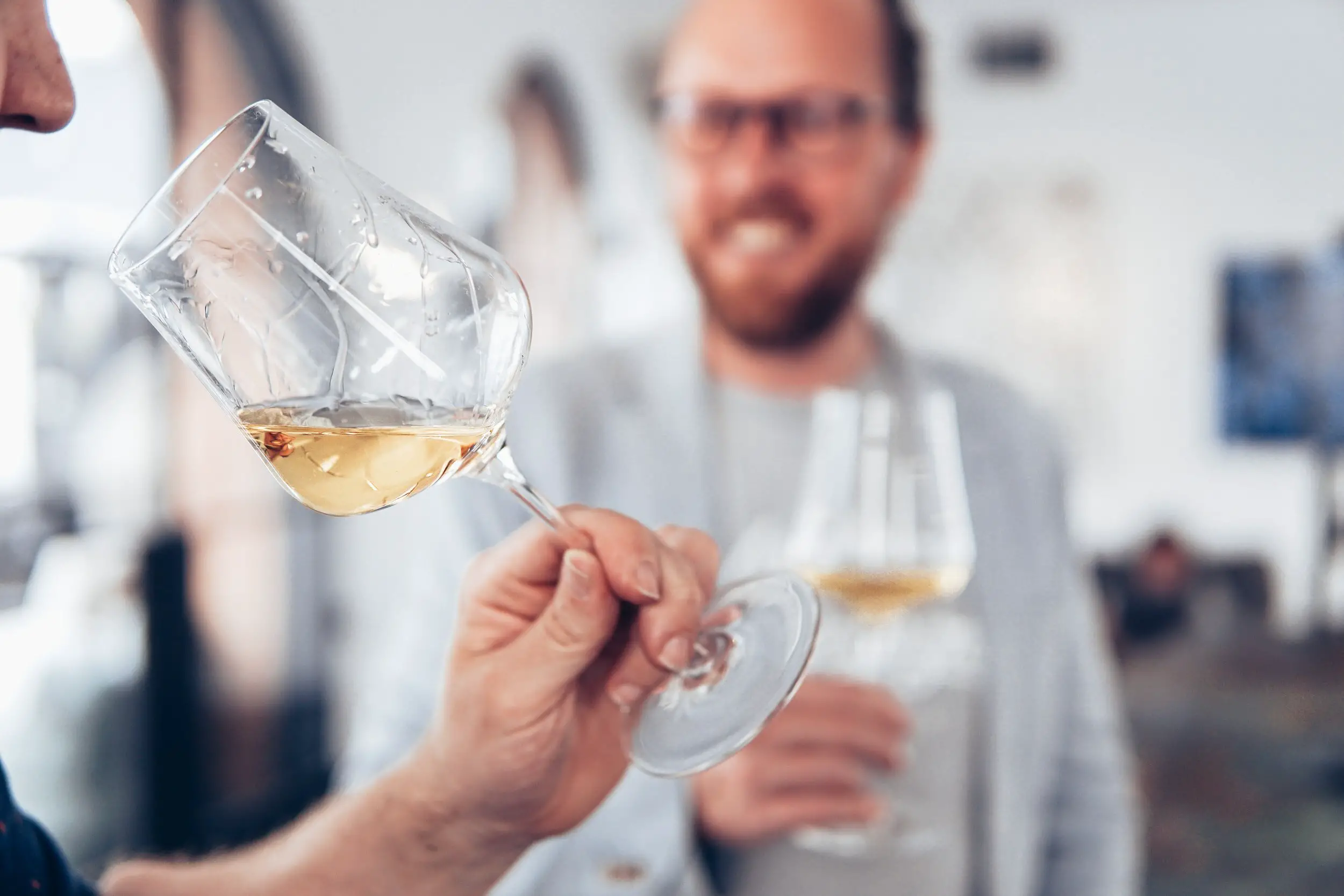 how does alcohol affect wine - person sipping white wine