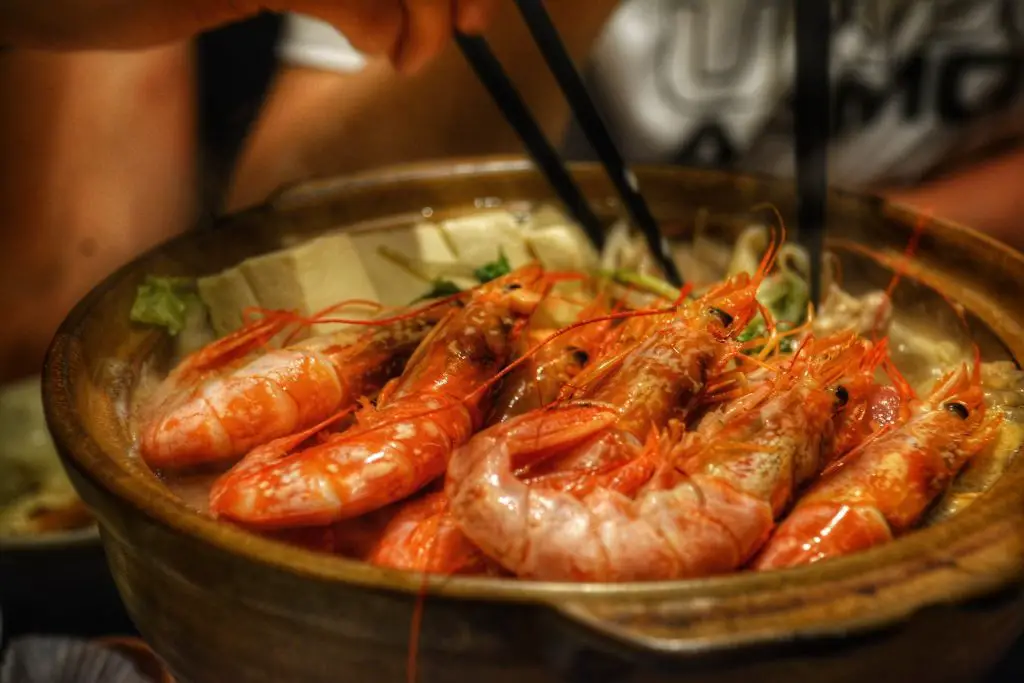 cooked shrimps on brown ceramic bowl - viognier wine pairing