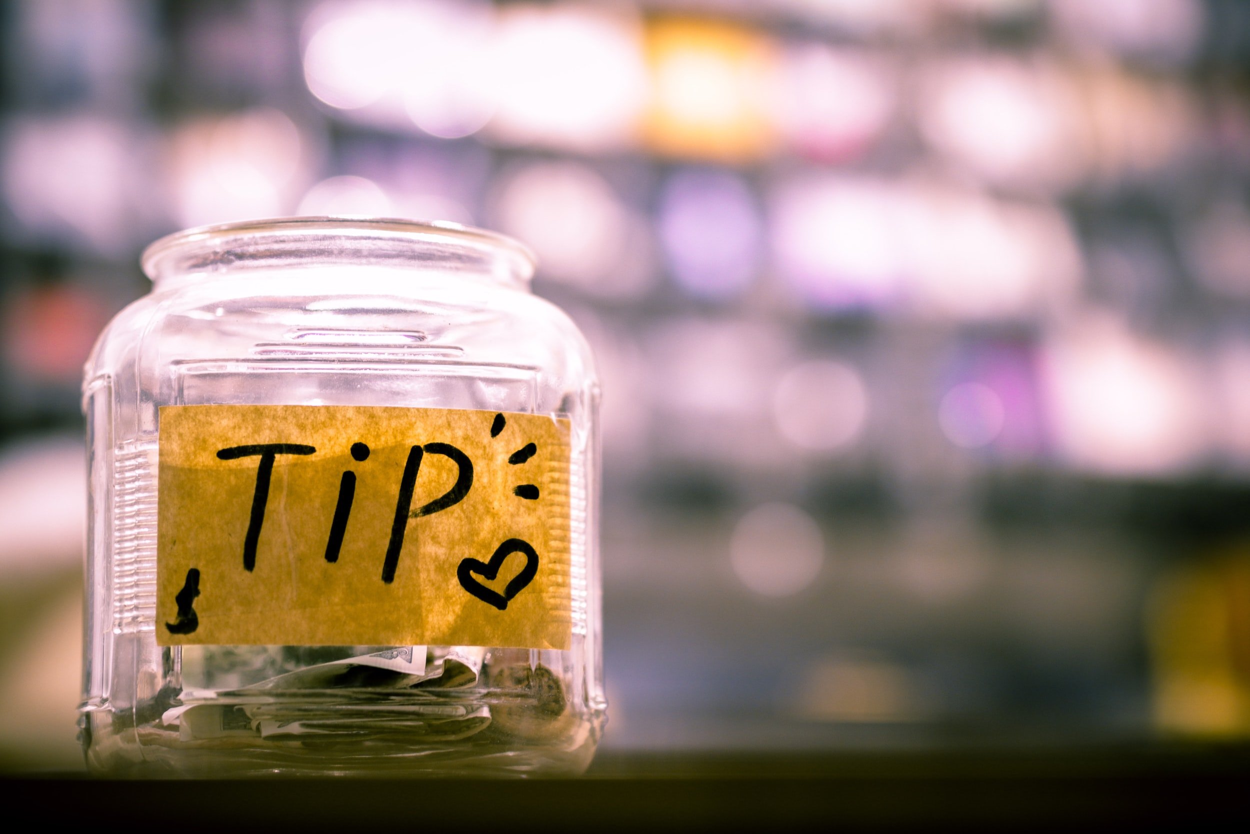 tipping at wine tasting - tip jar - how much do you tip at a wine tasting