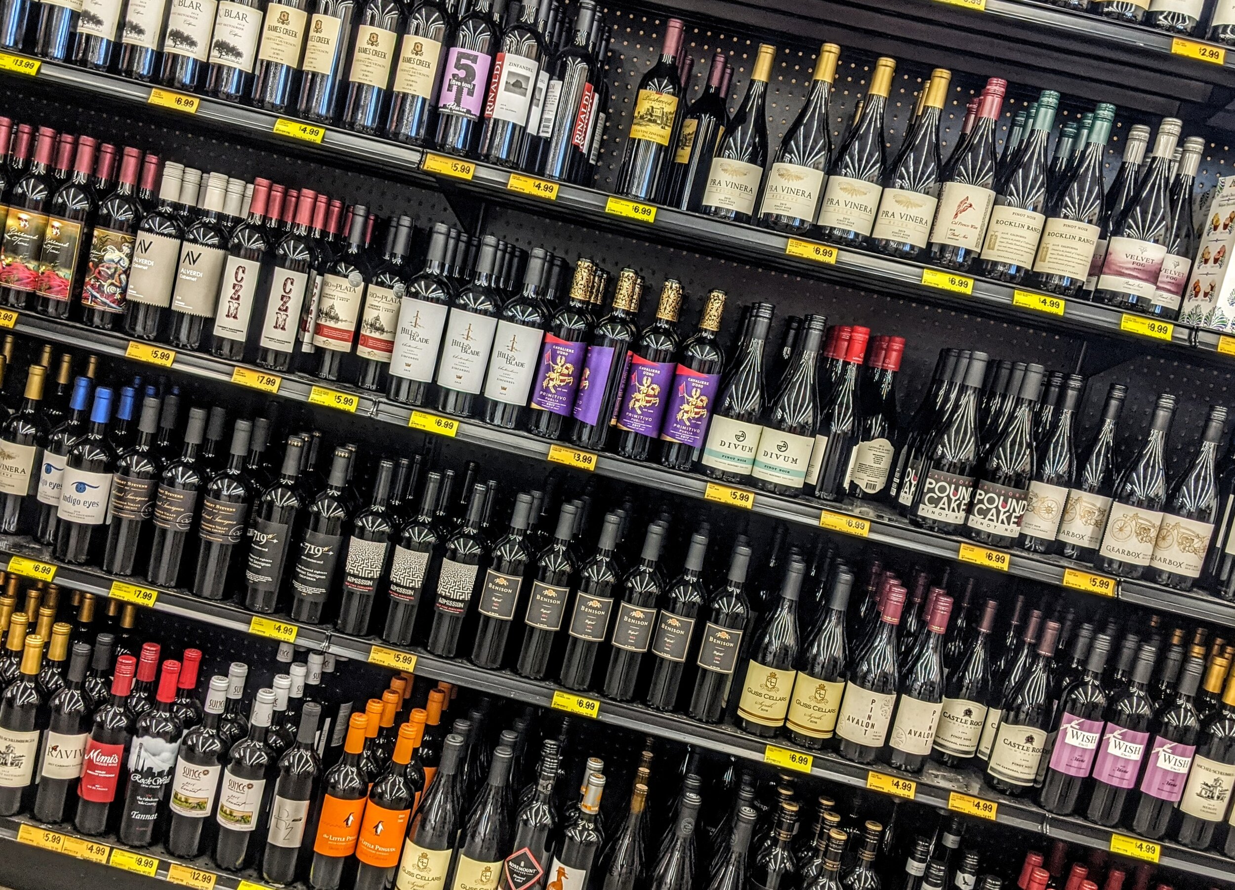 store wine shelf - tannat vs pinot noir