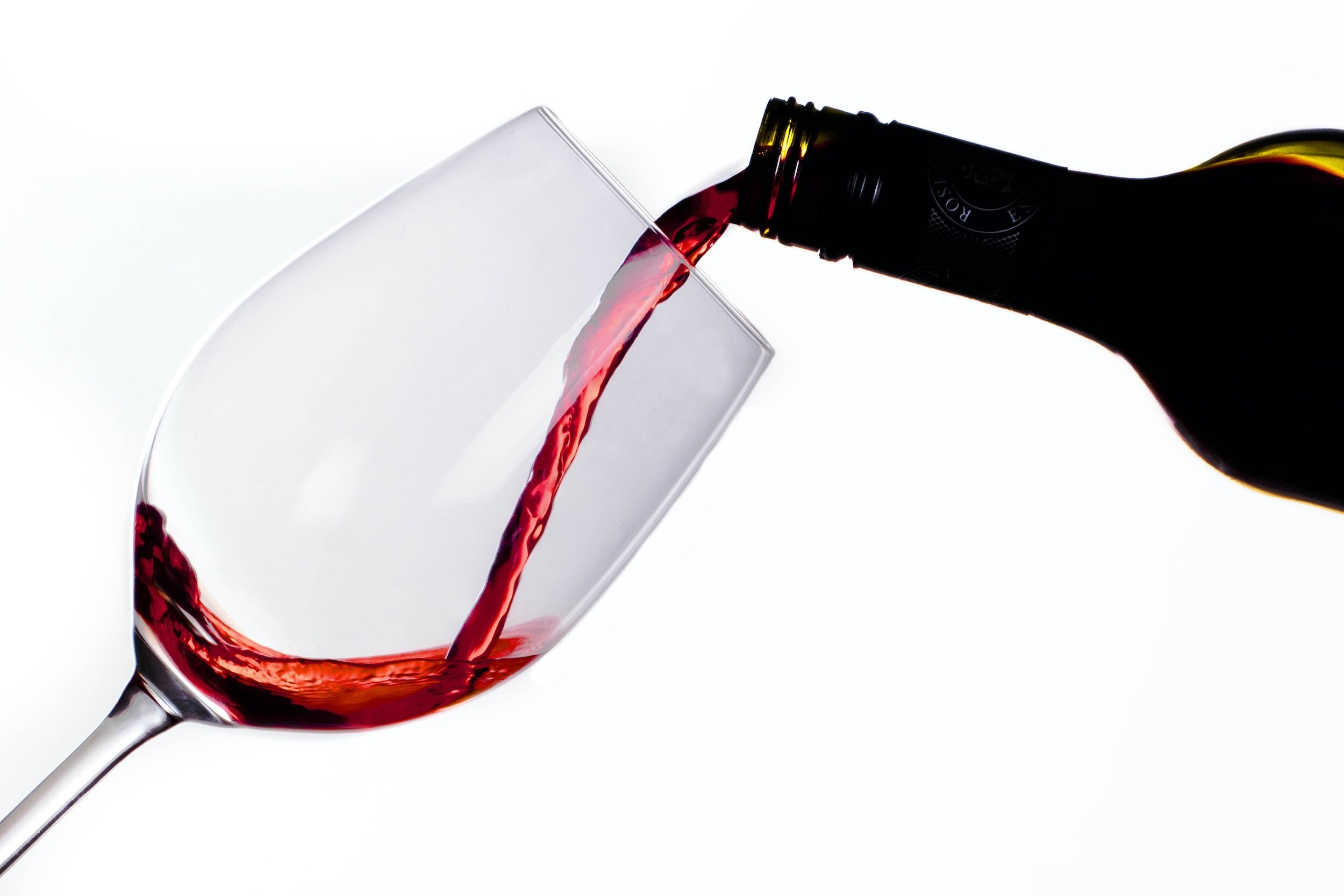 how to save money on wine - pouring wine